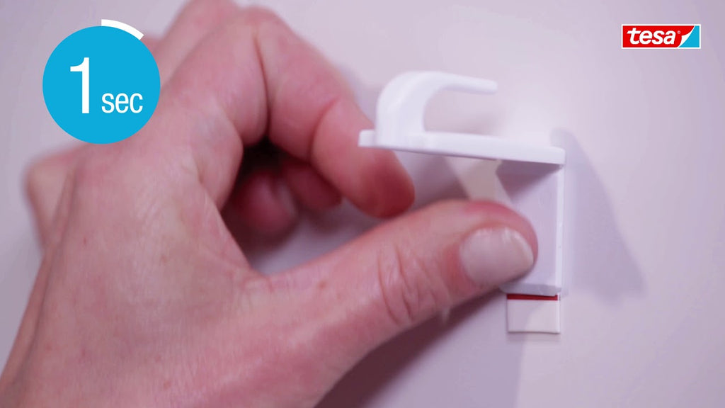 In the video, you can see a very convenient bathroom hack: How to mount a bathroom hook without drilling