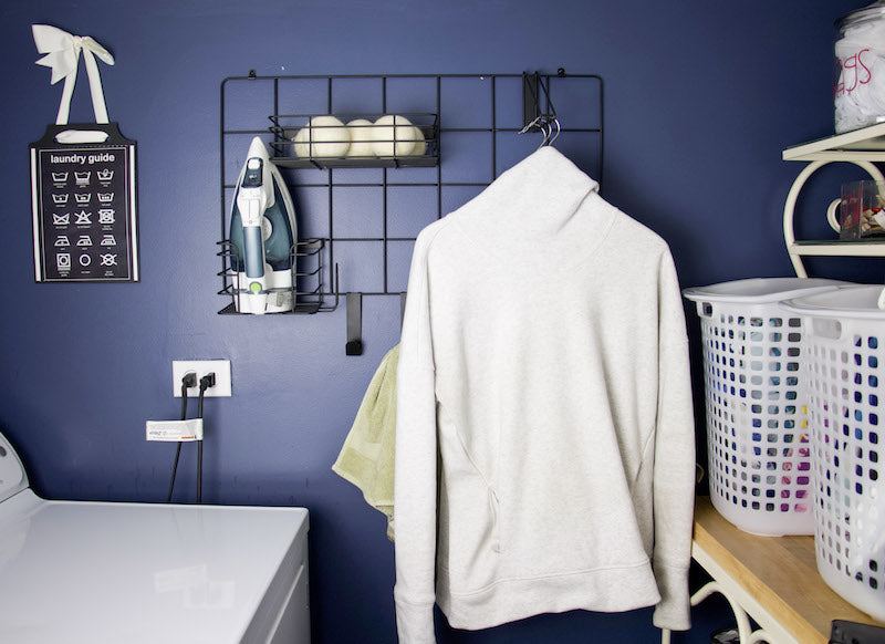If you have a small laundry room, you know that you need to use all the space possible or it totally turns into a dumping zone! Our laundry room is a small box, with a washer, dryer, and a bunch of vents and heating ducts