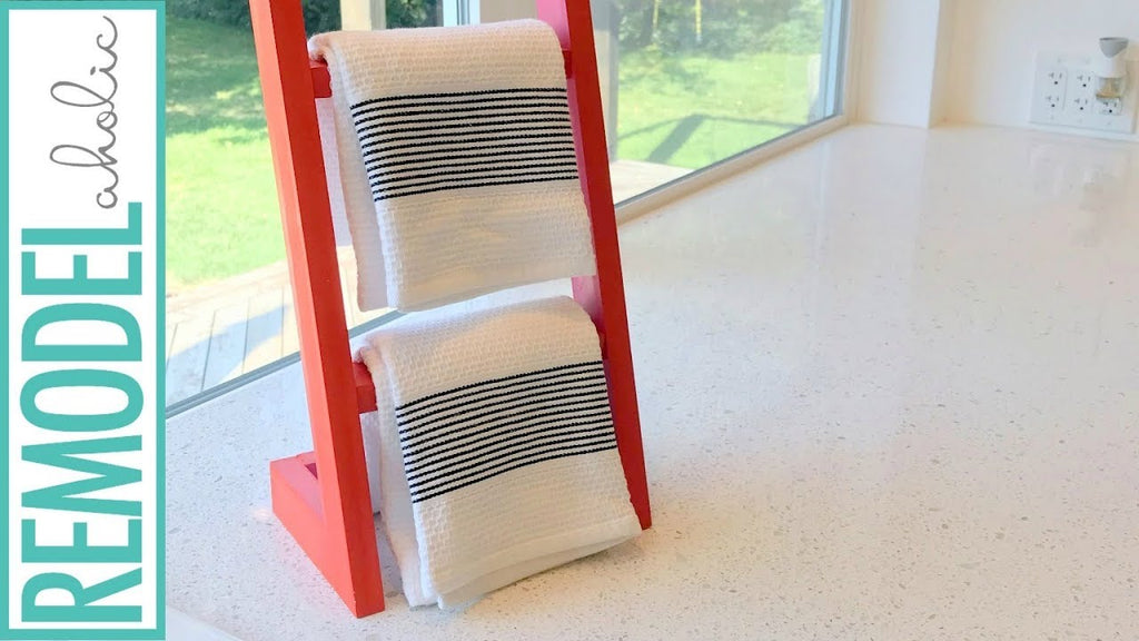 Build this easy countertop ladder (think mini freestanding blanket ladder) to hold hand towels by the sink, or utensils and spices near the stove
